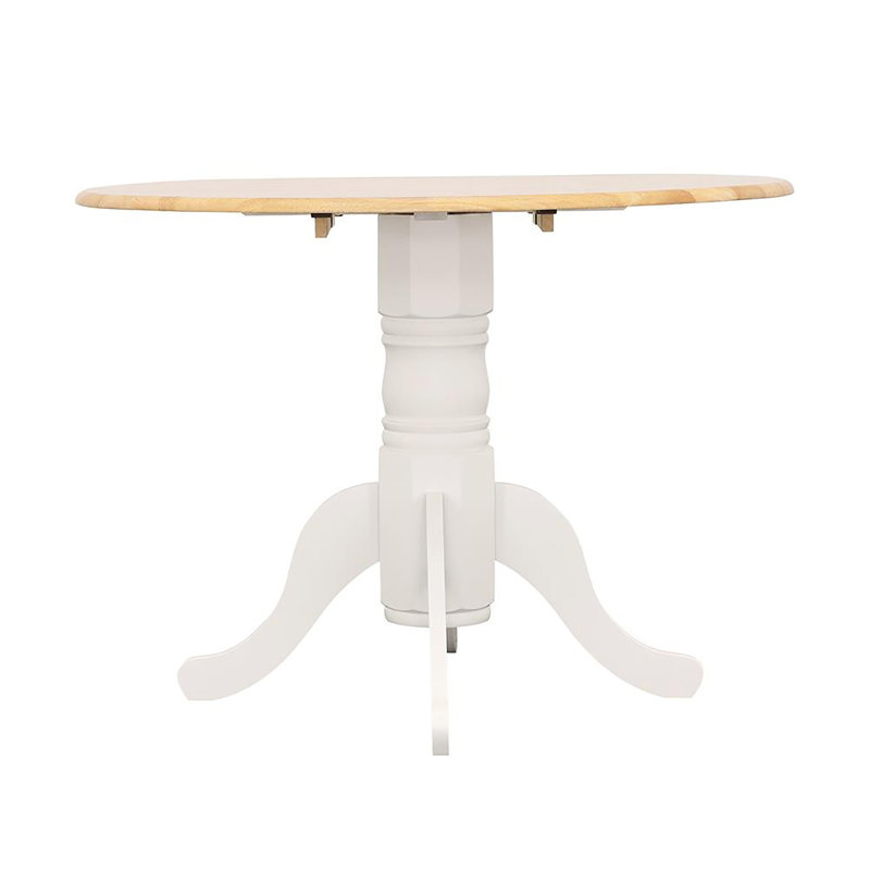 Versatile Drop Leaf Table With Stylish Pedestal Base And Ornamental Legs For Intimate Dining And Space Adaptability.