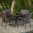 Donahoe 4 - Person Wicker Patio Dining Set with Round Table