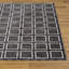 Tapis à motif géométrique moderne-117216111