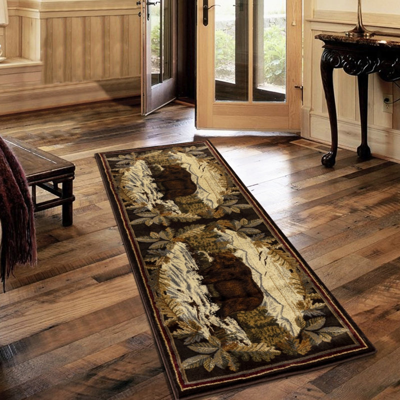 Tapis Lodge - Mimics Forest Scenery, fabriqué en polypropylène, pour une utilisation brune avec un design texturé, très fréquenté