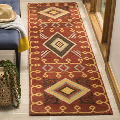 Tapis décoratif rouge / multicolore en laine touffeté à la main à motif géométrique Boyd