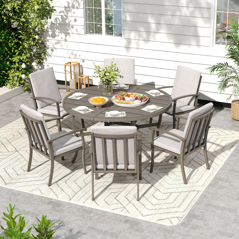Ensemble repas 7 pièces en aluminium gris avec table ronde et coussins lavables gris clair Moffett
