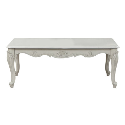 Kirsteni Solid and Manufactured Wood Rectangular Coffee Table 
