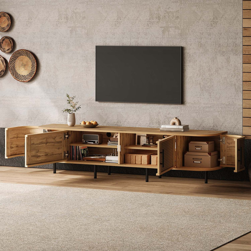 Console multimédia avec rangement spacieux et gestion des câbles, idéale pour le divertissement dans le salon