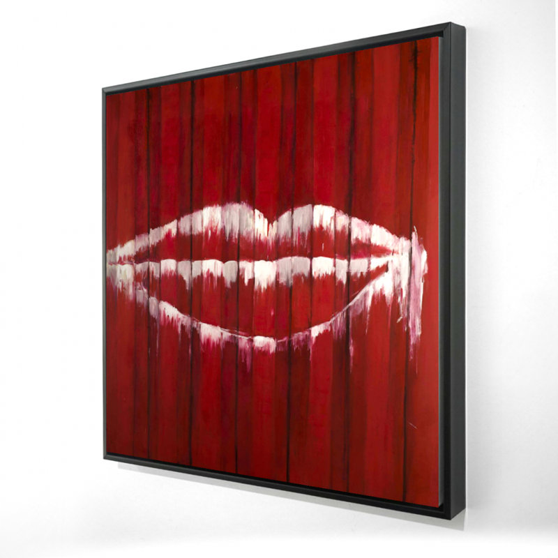 "Graffiti d'une bouche sur un contenant"