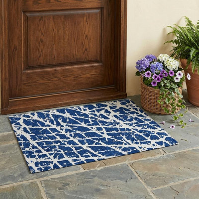 2' X 3' Navy and Ivory Abstract Washable Non Skid Indoor Outdoor Area Rug
