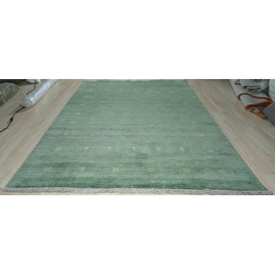 Karie Green Handmade Wool Area Rug