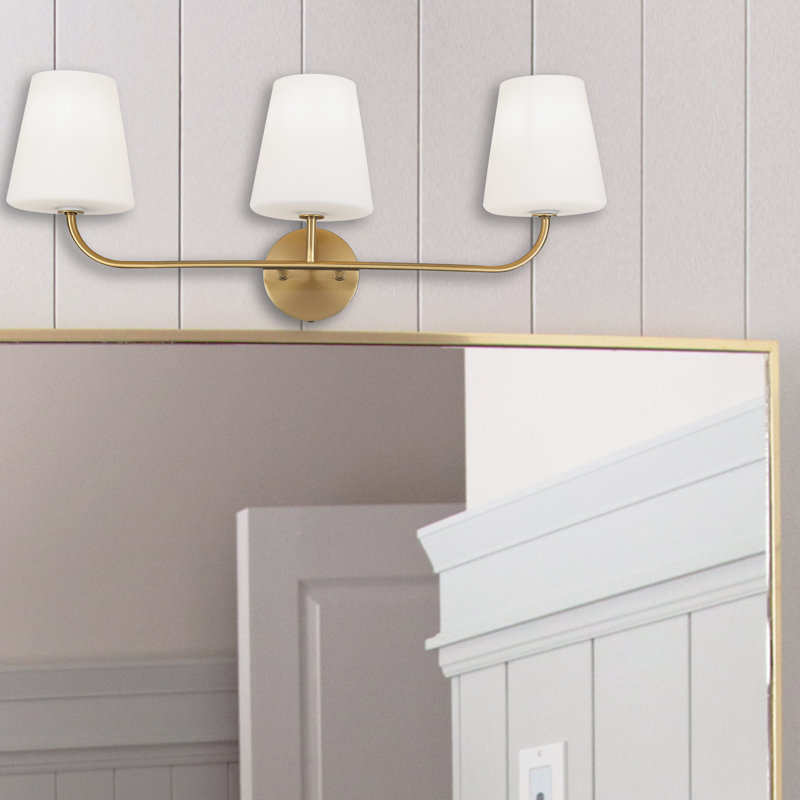 Éclairage pour meuble-lavabo à 3 lumières Arvell, Laiton vieilli