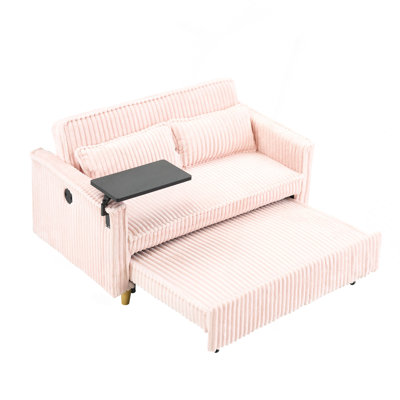 The pull-out and push-in pink corduroy sofa with dual functions, equipped with a movable tabletop and USB ports, is suitable for use in living rooms and bedrooms.