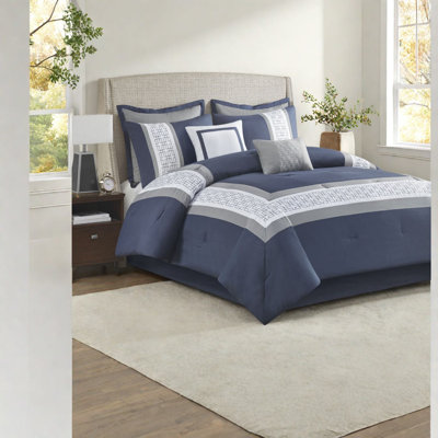 Ensemble de literie brodé bleu marine Elegant
