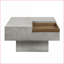 Table basse en fibre de béton gris patinée pour le salon, peu encombrante avec compartiment de rangement