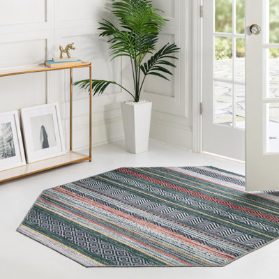 Tapis contemporain Abidur vert-ivoire