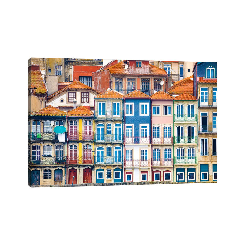 Europe, Portugal, Porto. Colourful Building Facades Next To Douro River. by Jaynes Gallery - Wrapped Canvas Print