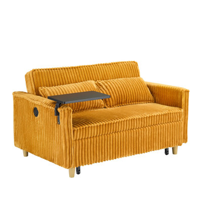 The pull-out and push-in corduroy sofa with dual functions, equipped with a movable tabletop and USB ports, is suitable for use in living rooms and be by Hokku Designs