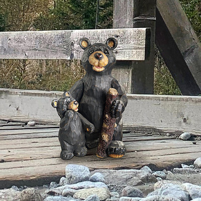 Statue paire d'ours noir forêt