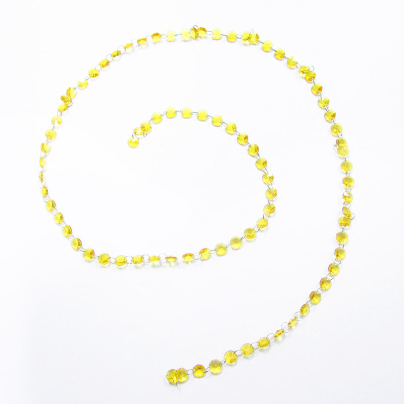 Ornement en forme de guirlande de perles en cristal