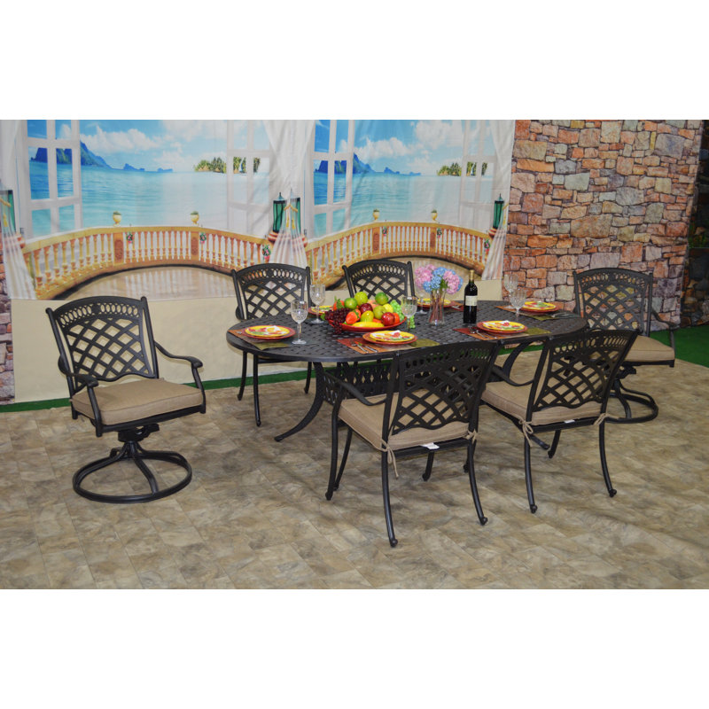 Ellston 6 - Person Patio Dining Set with Oval Table , Cushions Included