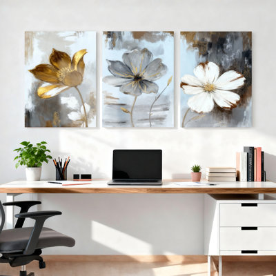Ensemble de 3 toiles murales abstraites à motifs floraux dorés, gris et blancs, style bohème moderne, pour salon, chambre ou décoration intérieure.