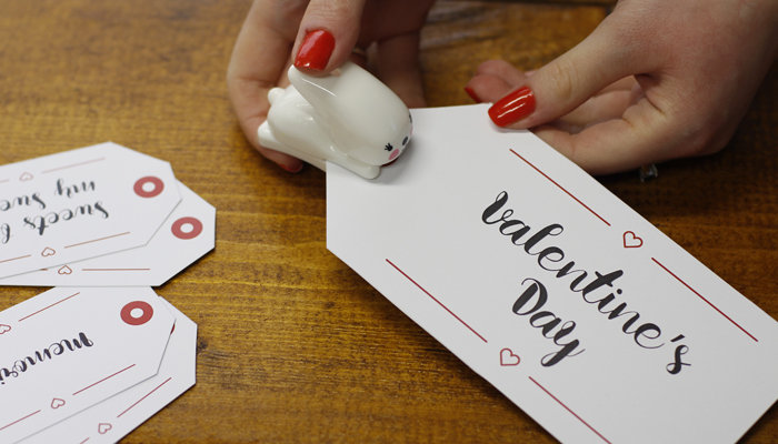 All you have to do is cut the gift tags out and punch a hole in the top.