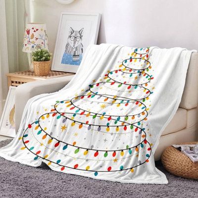 Plaid en flanelle motif sapin de Noël, étoiles dorées et ampoules arc-en-ciel, chaud, léger et douillet, idéal pour l'hiver, le lit ou la sieste au bureau. Lavable à la machine, 152 x 203 cm.