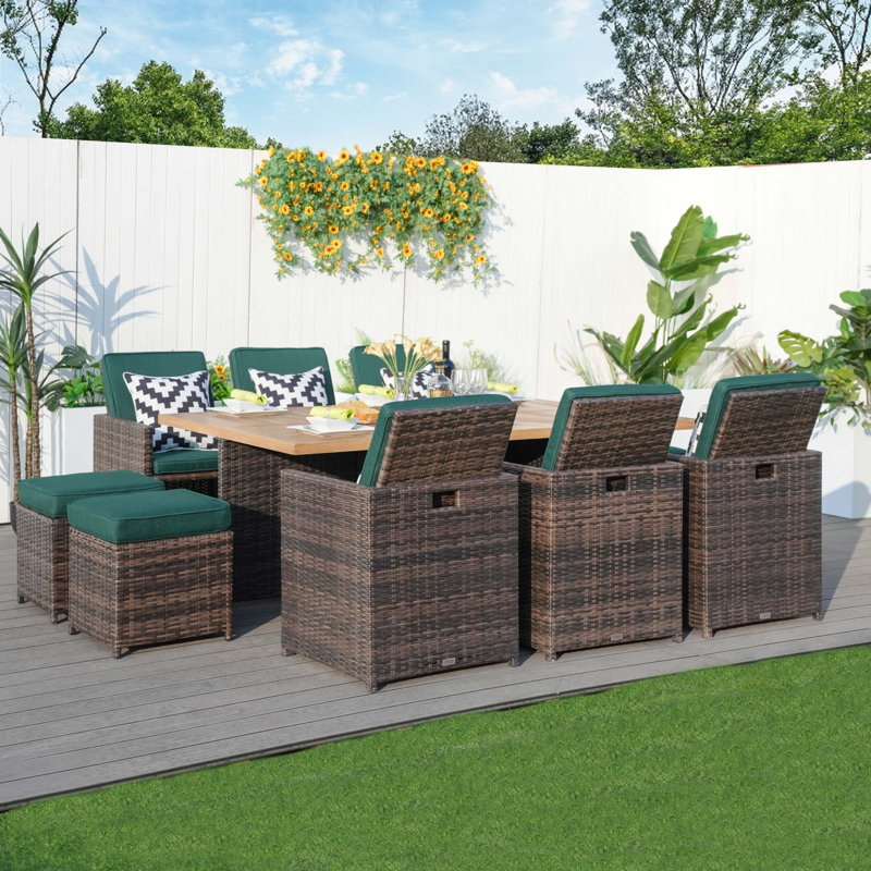 Daoudiate 6 - Person Wicker Patio Dining Set with Rectangular Table , Cushions Included, Brown, Green