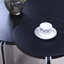 Ensemble de table basse et de table ronde avec surface en placage et pieds en pierre frittée pour une utilisation polyvalente, durable et élégante