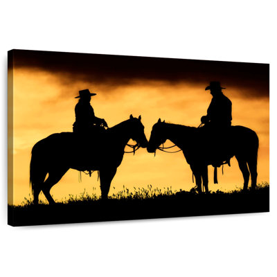 Lelar Cowboy And Cowgirl On Their Horses At Sunset