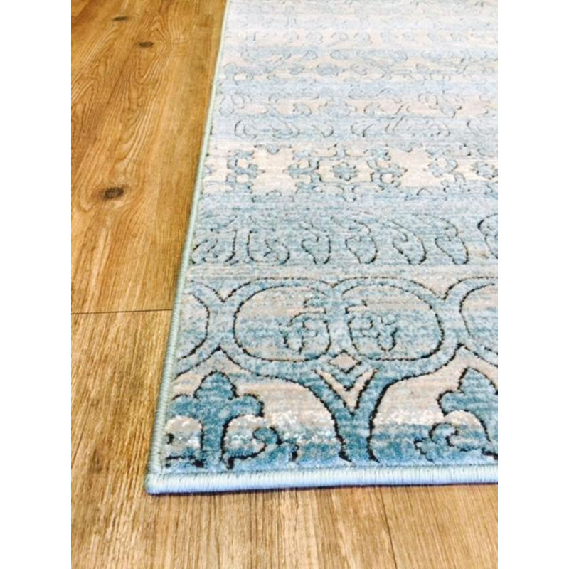 Tapis bleu clair touffeté Amalja