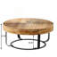 Table basse moderne et ronde à motif sculpté en bois avec pieds en métal