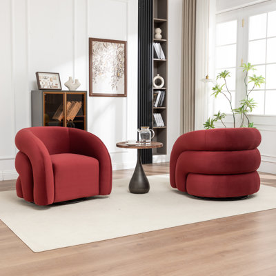 Fauteuil demi-tonneau pivotant rembourré Coyle