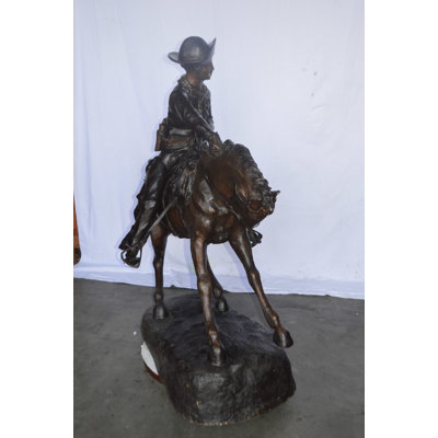 Giant Cowboy Remington Bronze Statue - Size: 66"L X 30"W X 58"H.