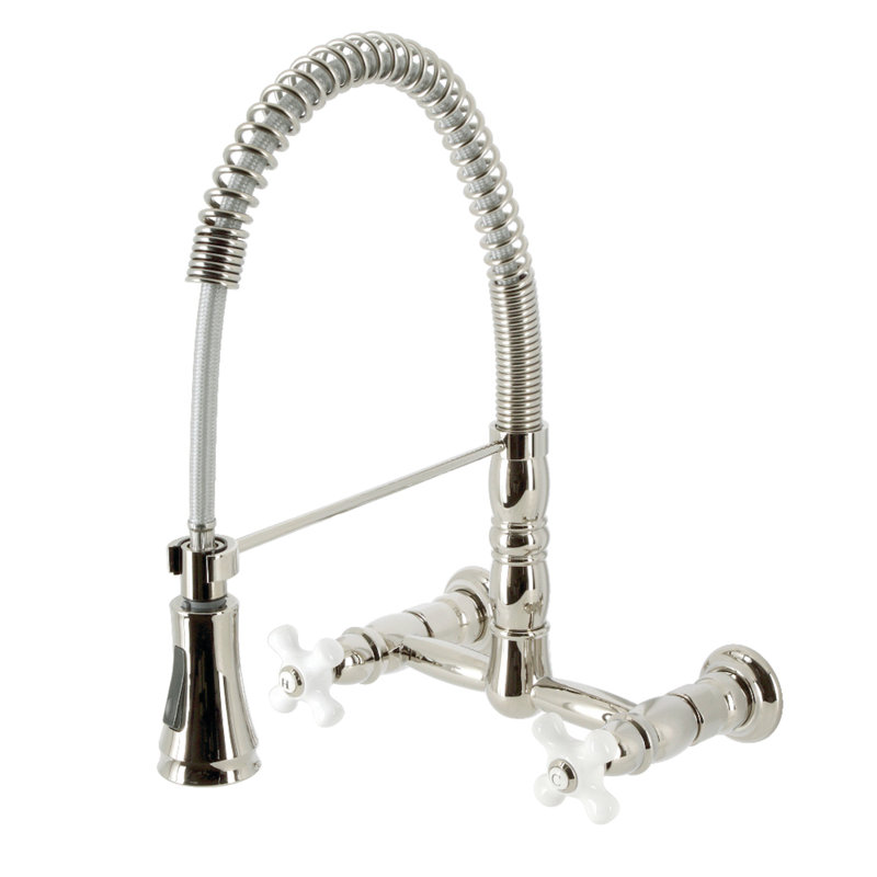 Kingston Brass Heritage Double-Handle 2-Hole Wall-Mount Pre-Rinse Bridge Kitchen Faucet, Antique Brass, Knob/Cross handle