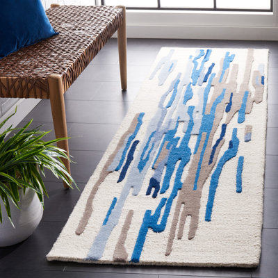 Tapis bleu / ivoire en laine / coton touffeté à la main Rodeo Drive