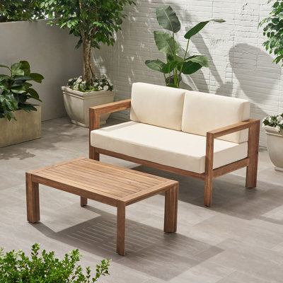 Table basse en bois et en bois avec coussins moelleux, brun et extérieur: coussins confortables