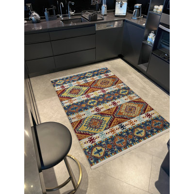 Tapis décoratif multicolore à motifs bleus et jaunes