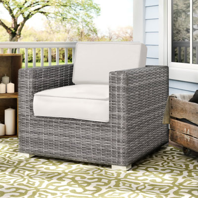 Chaise de patio avec coussins Jaxstin