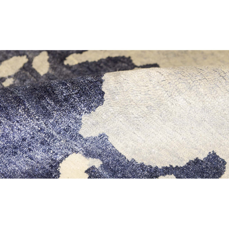 Tapis bleu de haute qualité noué à la main