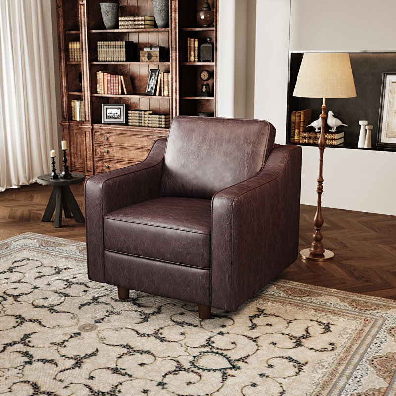 Fauteuil simple en similicuir brun foncé 