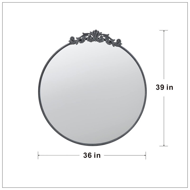 Miroir de conception classique avec forme ronde et cadre d'inspiration baroque pour la salle de bain, console de vestibule posée contre le mur