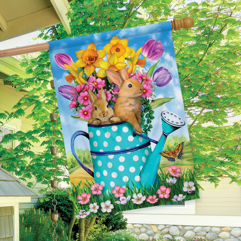Drapeau de lapin et arrosoir