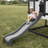 Backyard Discovery Sweetwater Heights White Cedar Wooden Elevated Kids Playhouse with Wave Slide, Play Kitchen, and Deck