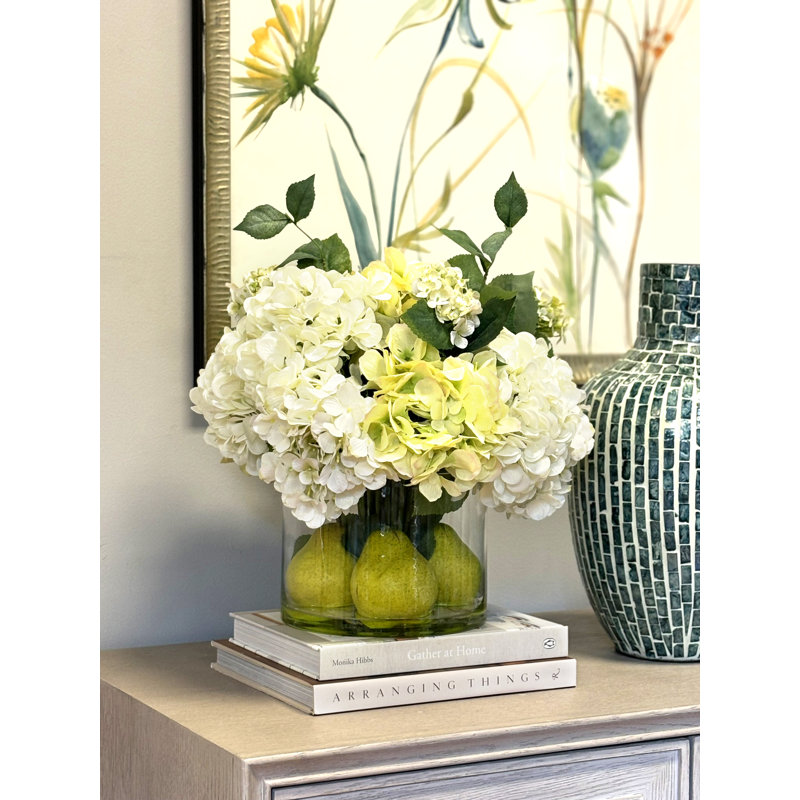 Hydrangeas Arranged in Glass Vase with Pears