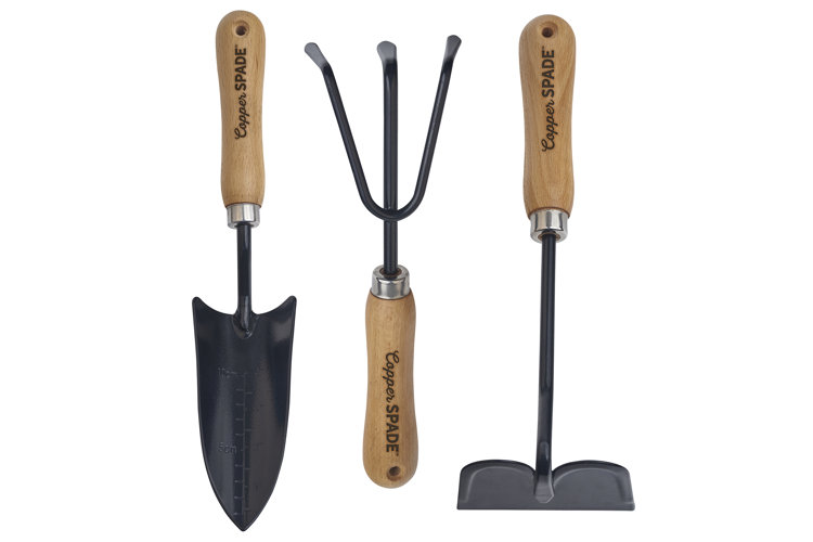 black metal tools with light wood handles