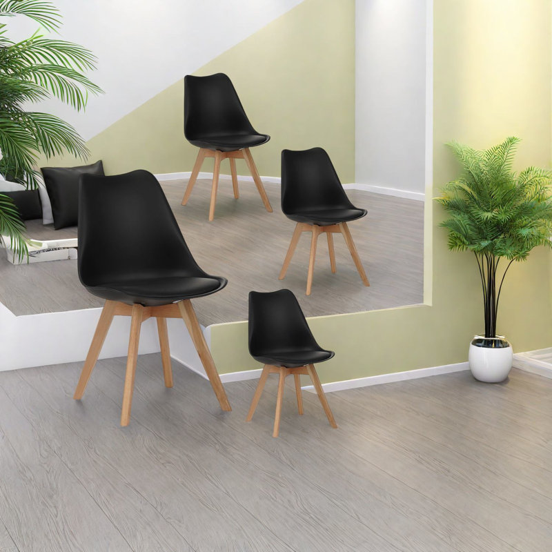 Ensemble de 4 chaises de salle à manger modernes et médiévales, chaises de salle à manger rembourrées en cuir de polyuréthane noir avec pieds en bois massif, capacité de poids de 300 lb