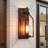 1-light Outdoor Wall Sconce With Cylindrical Seeded Glass