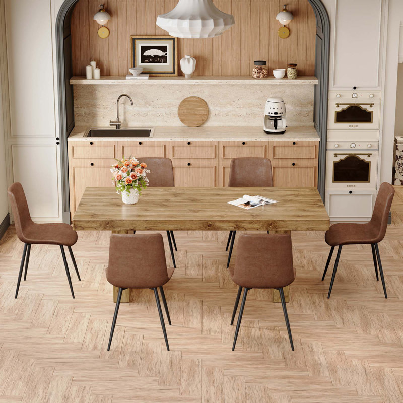 Ensemble de table et de chaises. Table de salle à manger en grain de bois MDF, jumelée à des chaises en tissu avec pieds en métal