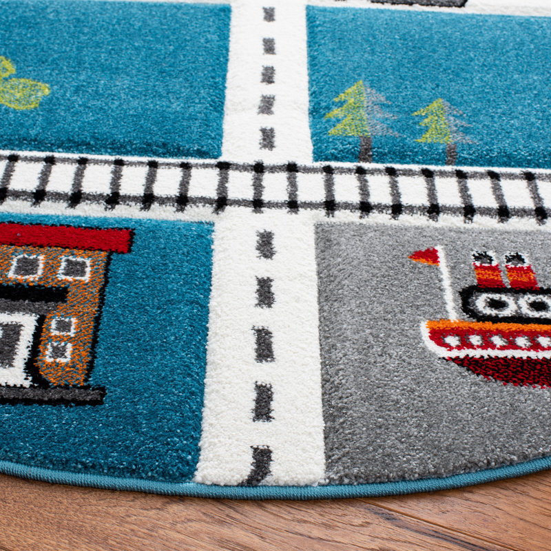 Tapis turquoise / ivoire pour enfants Hildreth, Rectangle 5 pi 3 po x 7 pi 6 po