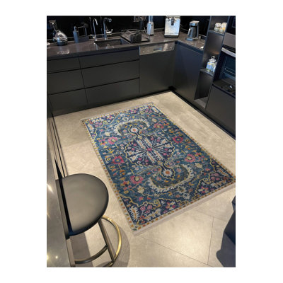 Tapis décoratif bleu marine à motif floral