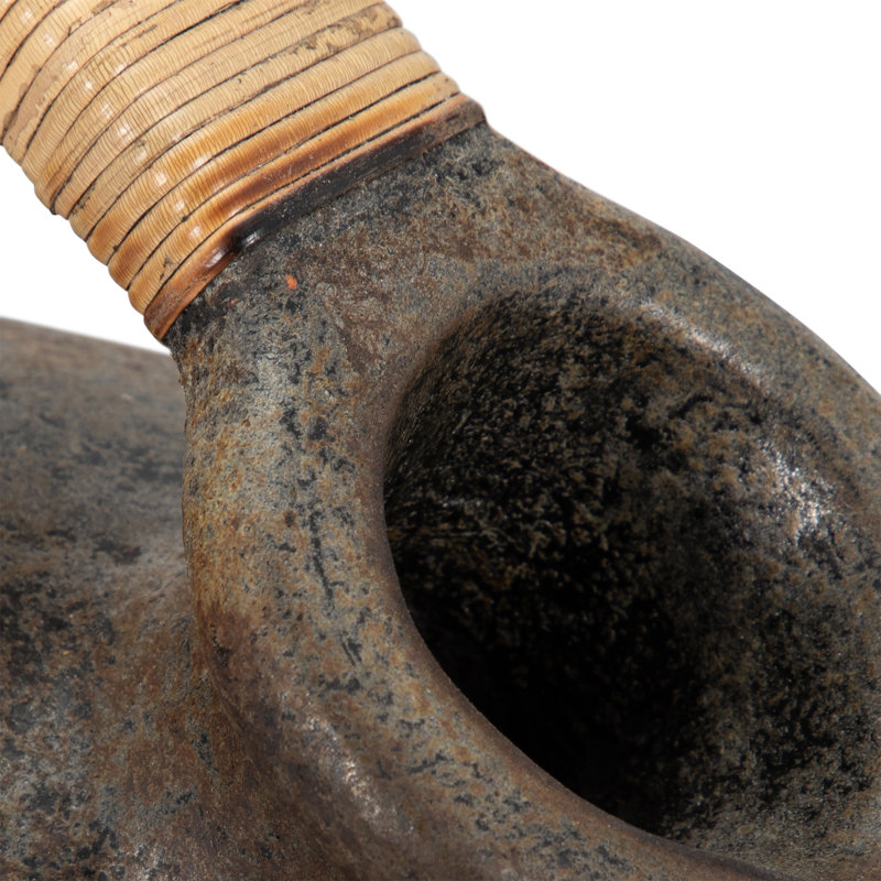 Decorative Terracotta Vase with Sculpted Form, Tilted Mouth, Matte Pottery Texture, and Woven Rattan Wrapped Handle for Textural Contrast and Handcrafted Visual Interest in Casual Home Accents
