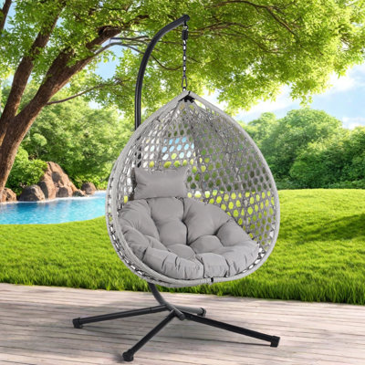 Versatile Hanging Egg Chair With Pe Rattan Hollowed-out Design, Iron Base, A Headrest And Cushion